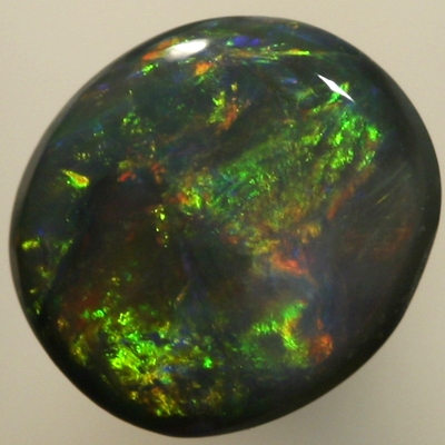 SOLID BLACK OPAL Bright flashes of green and orange